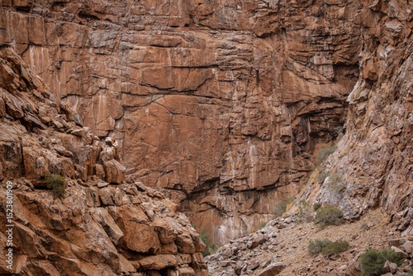 Fototapeta Lines and textures in rocks of mountain cliff