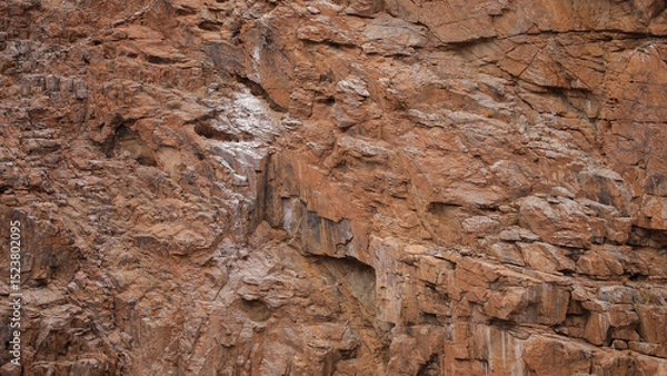 Fototapeta Lines and textures in rocks of mountain cliff