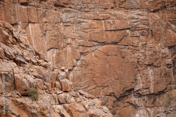 Fototapeta Lines and textures in rocks of mountain cliff