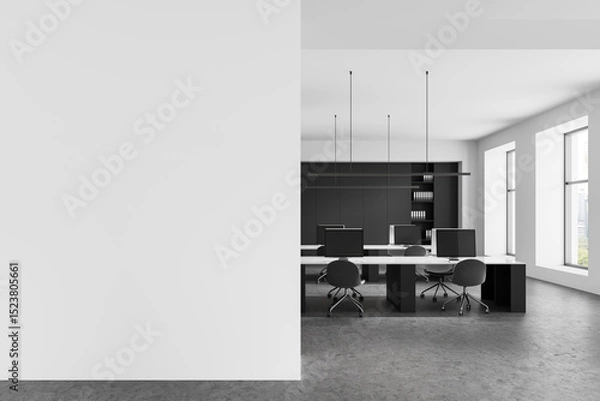 Obraz Modern office interior with blank wall for poster mockup, clean workspace layout with computers and large windows in bright minimal design. 3D Rendering