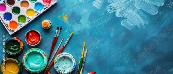 Fototapeta a scene of a craft room with art supplies arranged in a grid, including paints, brushes, and canvases, inspiring artistic expression and creativity in hobbyists.