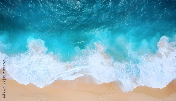 Obraz Ocean waves on the beach as a background. Beautiful natural summer vacation holidays background. Aerial top down view of beach and sea with blue water waves