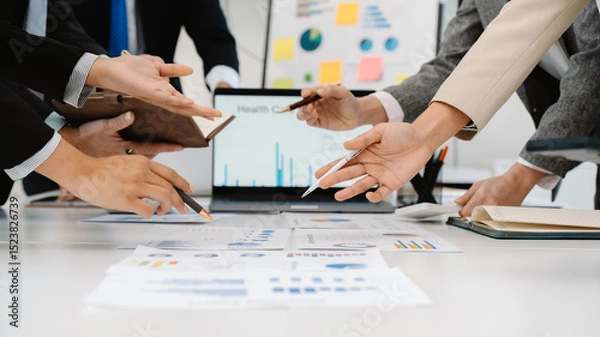 Fototapeta Business Team Analyzing Data and Charts