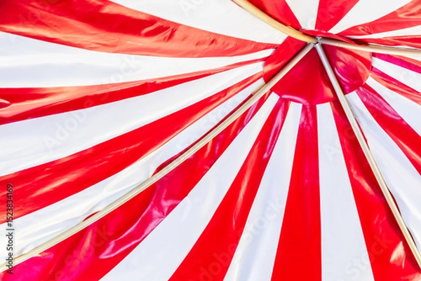 Fototapeta Circus tent background. Colorful design, striped white and red, retro style.