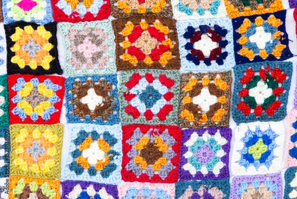 Fototapeta Multi colored blanket in wool, square geometric background, retro decorative pattern