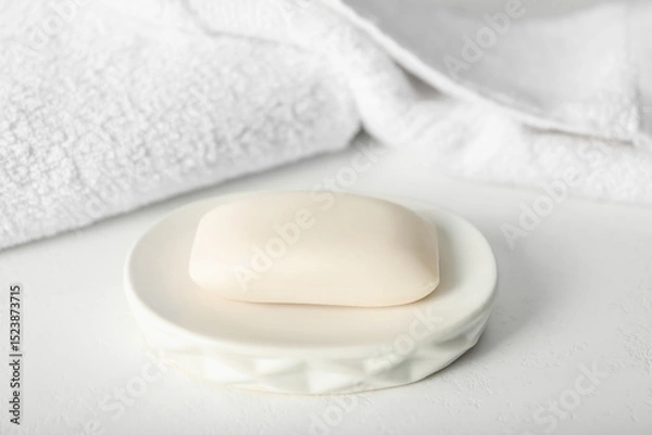 Obraz One soap bar on white table, closeup