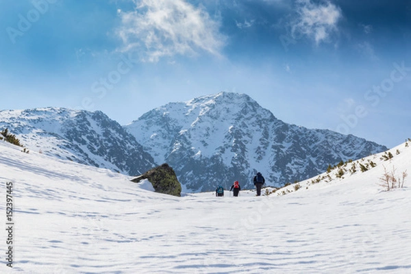 Fototapeta Winter scenery in the Transylvanian Alps with storm clouds and fresh snow