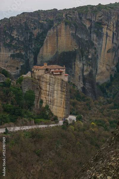 Obraz Landscape of the famous rock formations of Meteora with country road and Roussanou Monastery on top of the rocks, Kalambaka, Thessaly, Greece
