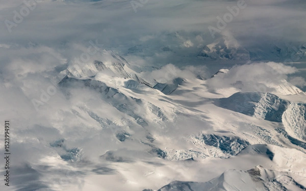 Fototapeta Mountain and clouds view of the Antarctica.