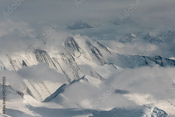 Fototapeta Mountain and clouds view of the Antarctica.