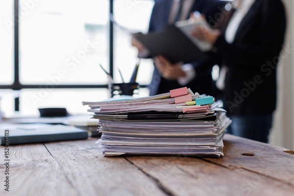 Obraz Business Documents,  business people checking and charts to analyze market data, balance sheet, account, net profit to plan new sales strategies to increase production capacity.	
