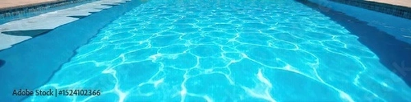 Fototapeta A sparkling blue swimming pool on a sunny summer day, perfect for a refreshing dip Clean water shimmers under the bright sunlight, inviting relaxation and fun , calm, swimming
