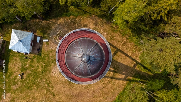 Fototapeta Exploring the historical lighthouse structure on Ruhnu Island in Estonia during daylight