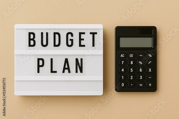 Fototapeta Budget Planning Concept with Calculator and Letter Board on Brown Background