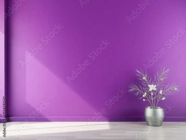 Fototapeta A modern interior with a vibrant purple wall and a silver pot containing decorative flowers. Natural light casts shadows on the floor.