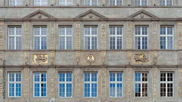 Fototapeta Fragment of old ornate building facade