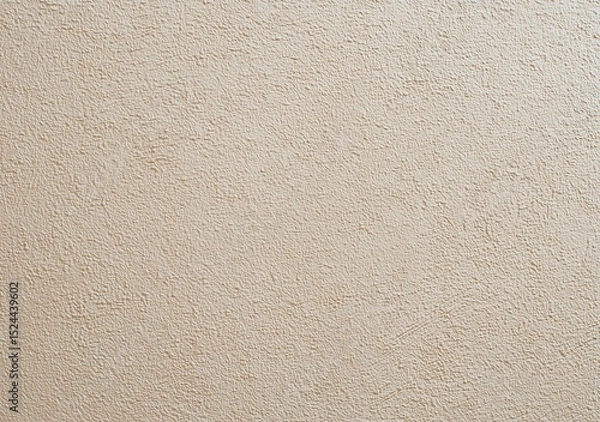 Fototapeta Wall with a tan color and a rough texture