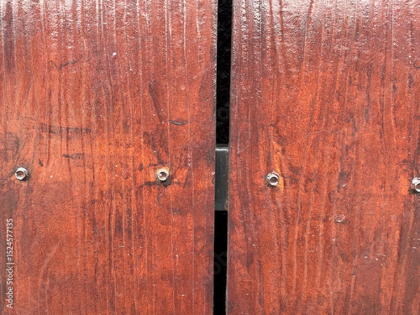 Fototapeta Close up Background of GRC wall sheet with wood motif with rows of screws attached