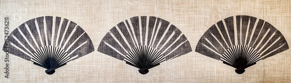 Fototapeta Three traditional folding fans displayed against a neutral background.