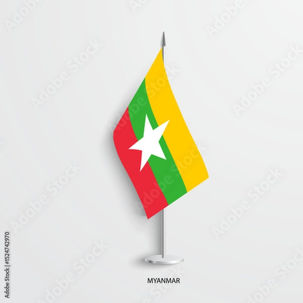 Fototapeta Myanmar table flag on light grey background. Myanmar desk flag isolated on grey background	
