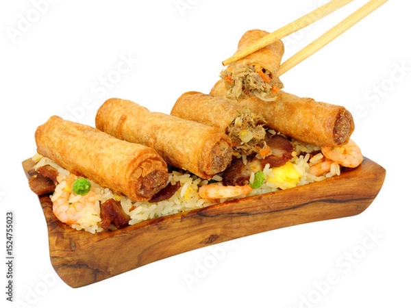 Fototapeta Chinese duck meat and vegetable spring rolls with special fried rice in a olive wood serving dish isolated on a white background