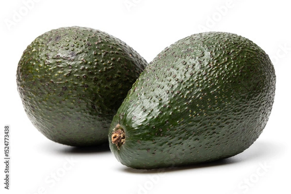 Fototapeta Two Ripe organic green avocado fruits isolated on white background with built-in clipping path