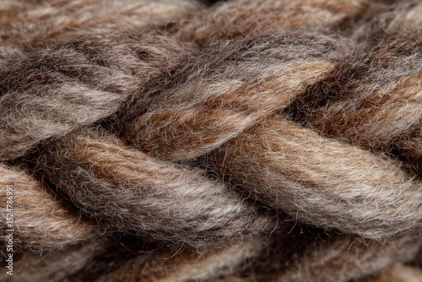 Obraz Twisted strands of fiber form a dense, tactile surface ideal for handmade aesthetics, knitting content, or textile design themes with a natural, warm appeal.


