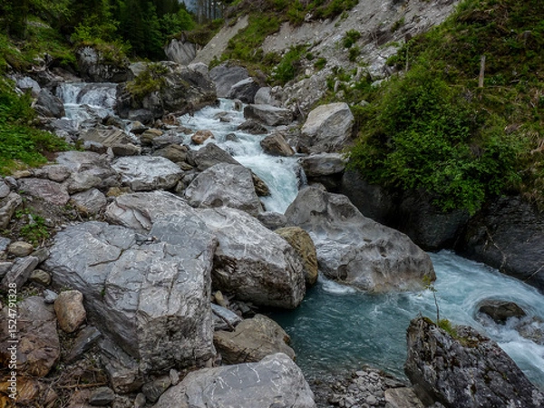 Obraz Switzerland, Meiringen, a large waterfall over a rocky cliff