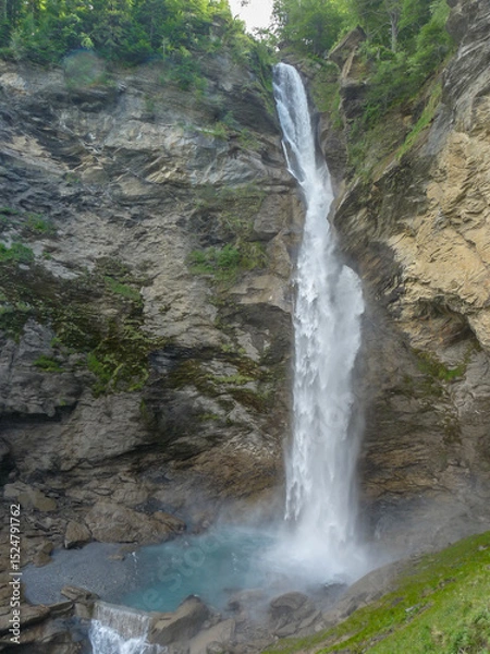 Obraz Switzerland, Meiringen, a large waterfall coming out of the water