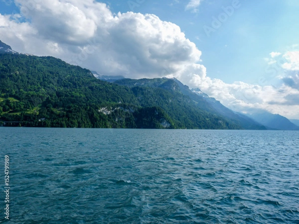 Obraz Switzerland, Meiringen, a large body of water with a mountain in the background