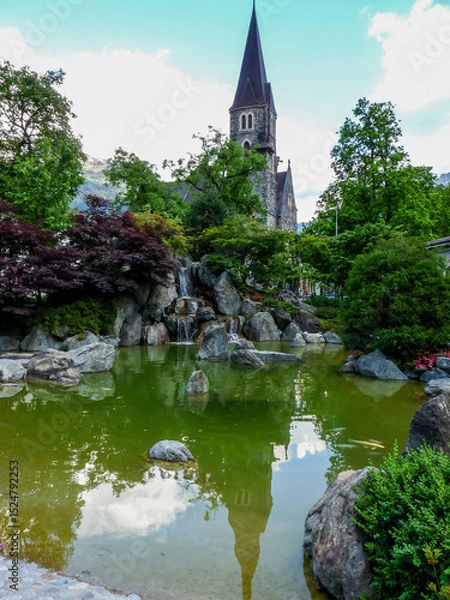 Obraz Switzerland, Meiringen, a large body of water surrounded by trees