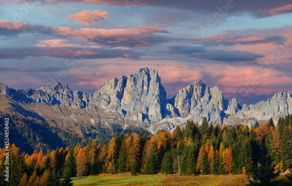 Obraz a splendid sunset on the Belluno Dolomites surrounded by the colours of Autumn