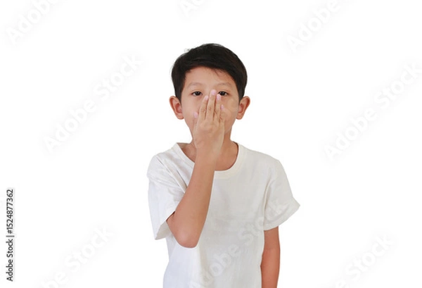 Obraz Portrait of Asian boy child age 7-8 years old covering his mouth and nose with hand isolated on white studio background.