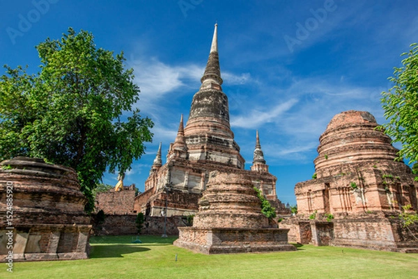 Obraz Background of ancient sculptures of the chedi in Wat Yai Chai Mongkol, Ayutthaya, Thailand, which is worth preserving for future generations to study its history.