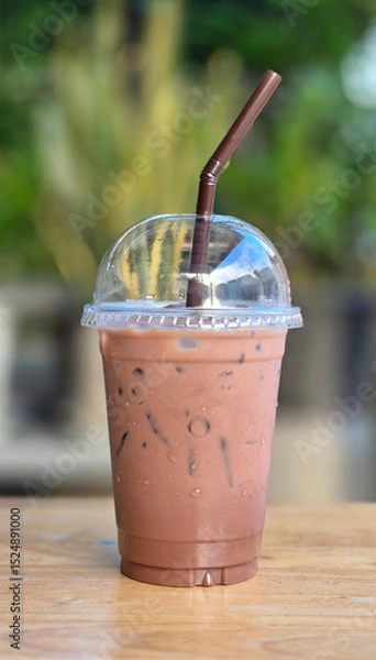 Obraz Iced Chocolate, Cocoa in clear plastic cup on wooden table in the garden.