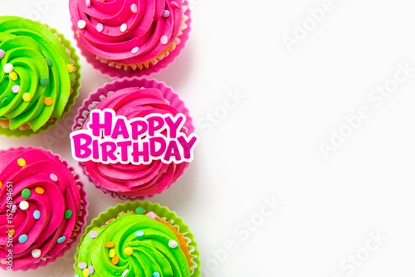 Fototapeta Colorful cupcakes with Happy Birthday message on white background