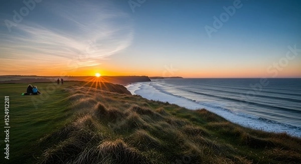 Fototapeta Coastal View with People and Sunset Scenery