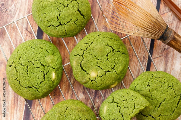 Obraz Chewy matcha chocolate chip cookies on cooling rack.