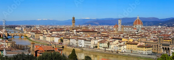 Fototapeta Wide view of Florence city with arno river and main monuments from Old Bridge  to town hall palace and dome of duomo with vivid vibrant colors