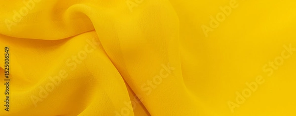 Fototapeta Yellow Silk, satin fabric texture with folds and waves. Textile. Material. Fashion