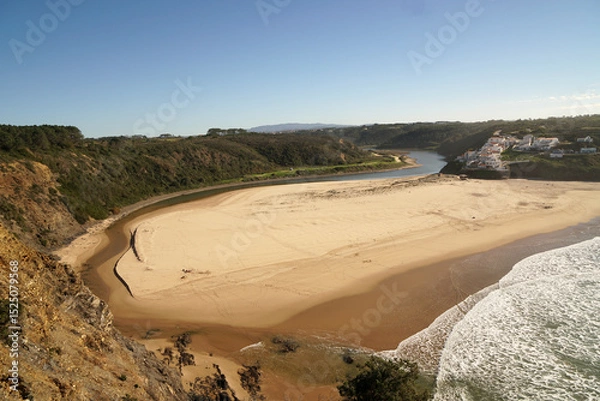 Fototapeta Odeceixe Beach and river seen from above                               