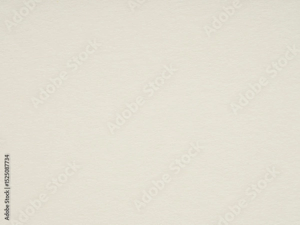Fototapeta Warm off-white paper texture speaks of a blank canvas, ready to capture the strokes of untold stories