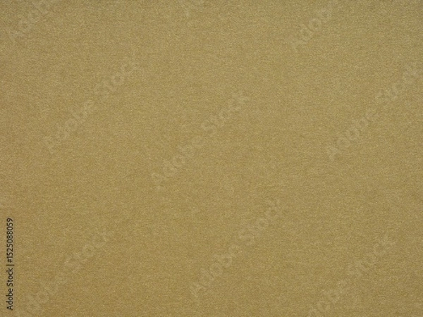 Fototapeta Gleaming gold paper texture whispers luxury and opulence with its vibrant, textured surface