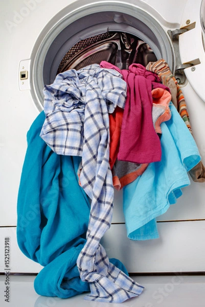 Obraz Washing machine with clean linen...