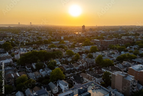 Fototapeta City viewed from high rise: bustling streets, tall buildings, traffic