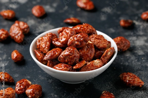 Fototapeta Caramelized almonds. Toasted almonds coated with caramel syrup.