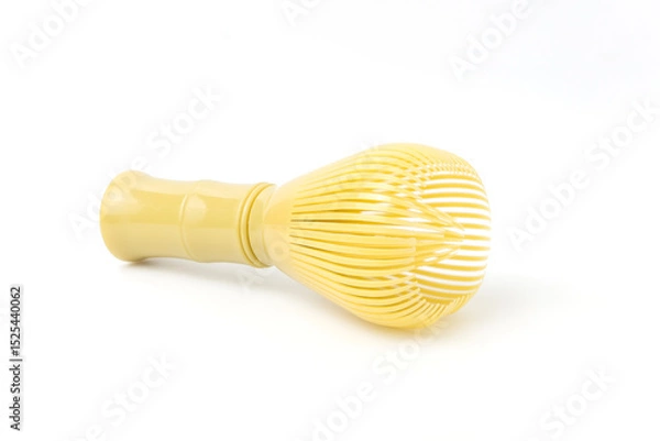 Fototapeta Yellow Kitchen Whisk, Chasen Isolated on White Background with Distinctive Spiral Design