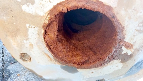 Fototapeta Rust and Clay Deposits in Artesian Well Pipe Showcase Water Quality Issues and Aging Infrastructure