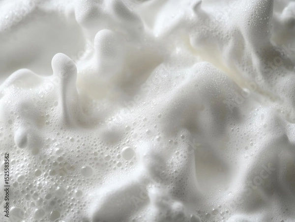 Obraz Soapy froth forming bubbles in water.