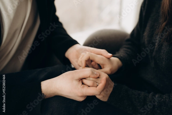 Obraz Couple hold each other hands.